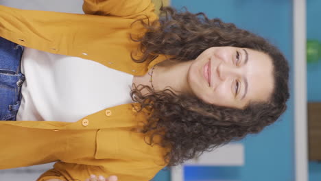 Vertical-video-of-Dancing-young-woman-with-phone-in-hand.